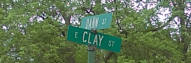 Dann Street and Clay Street Sign